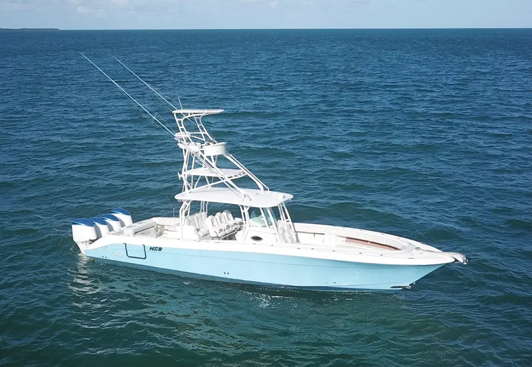  Yacht Photos Pics 2014 Hydra-Sports 42 boat on open ocean, featuring multiple outboard engines.