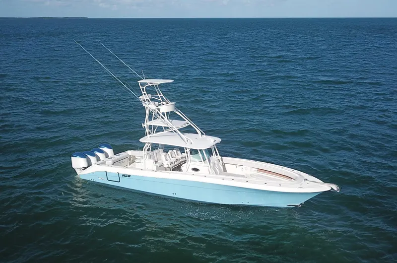  Yacht Photos Pics 2014 Hydra-Sports 42 boat on open ocean, featuring multiple outboard engines.