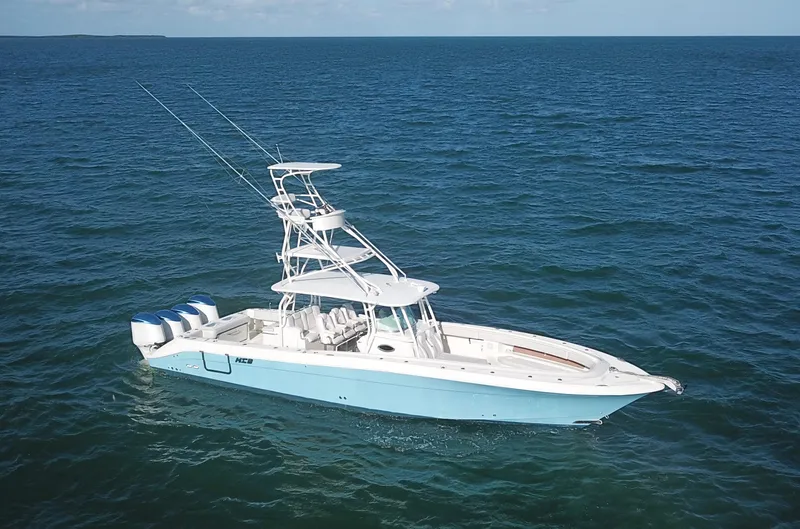  Yacht Photos Pics 2014 Hydra-Sports 42 boat on open ocean, featuring multiple outboard engines.