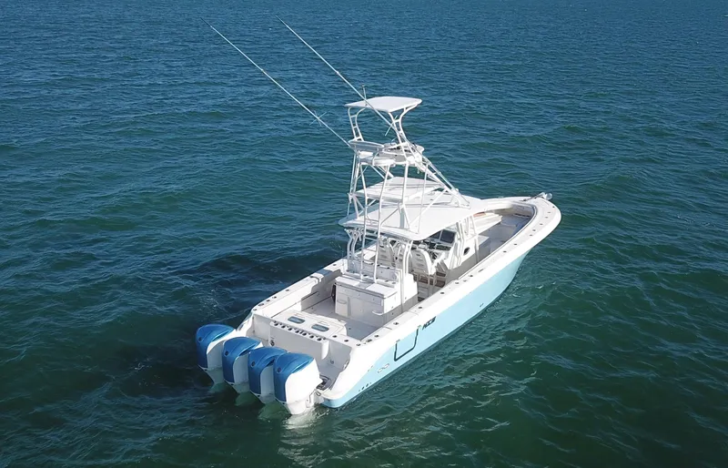  Yacht Photos Pics 2014 Hydra-Sports 42 boat with triple engines on open water.