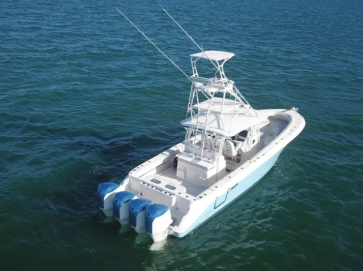  Yacht Photos Pics 2014 Hydra-Sports 42 boat with triple outboard engines on open water.