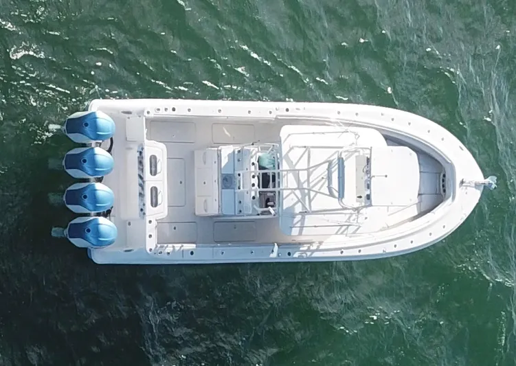  Yacht Photos Pics Aerial view of 2014 Hydra-Sports 42 boat on water with four engines.