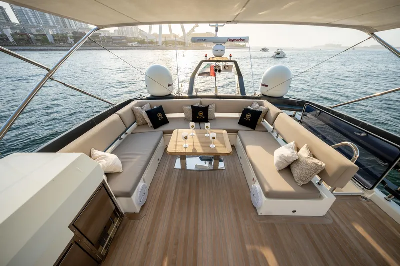  Yacht Photos Pics Luxurious 2016 Numarine 105HT yacht deck with elegant seating and scenic ocean view.