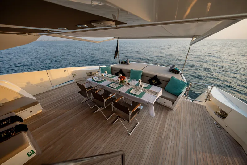  Yacht Photos Pics Luxurious dining area on 2016 Numarine 105HT yacht with ocean view.