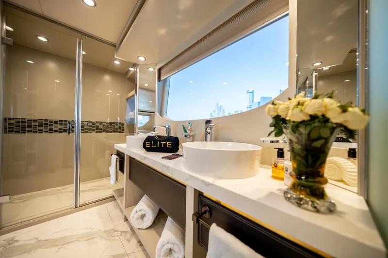  Yacht Photos Pics Luxurious bathroom on 2016 Numarine 105HT yacht with modern fixtures and elegant decor.