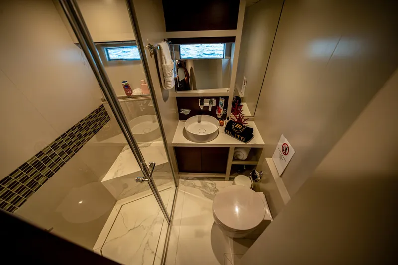  Yacht Photos Pics Luxurious bathroom in 2016 Numarine 105HT yacht with modern fixtures and elegant design.