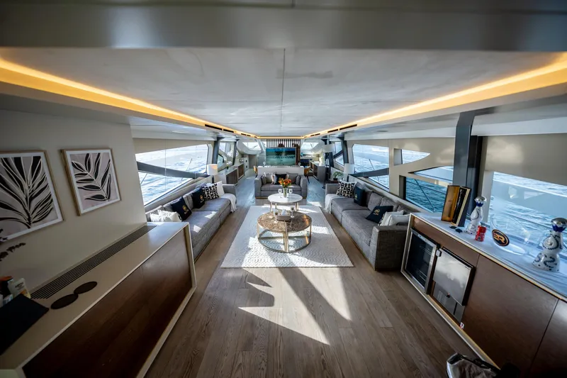  Yacht Photos Pics Luxurious interior of 2016 Numarine 105HT yacht with modern decor and panoramic windows.