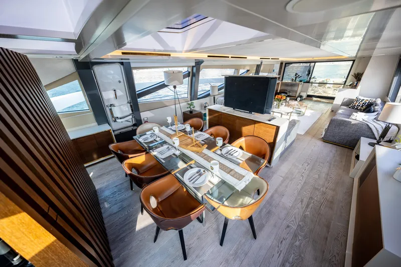  Yacht Photos Pics Luxurious interior of 2016 Numarine 105HT yacht with elegant dining area and modern decor.