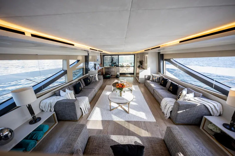  Yacht Photos Pics Luxurious interior of 2016 Numarine 105HT yacht with modern furnishings and panoramic windows.