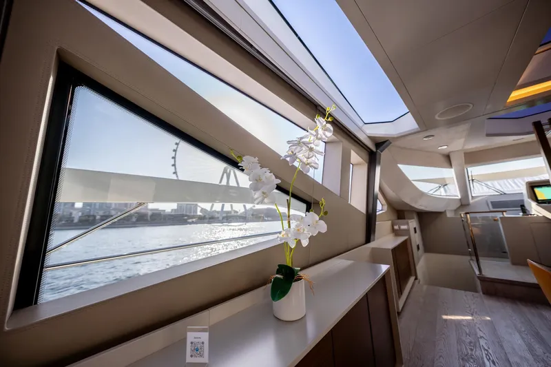  Yacht Photos Pics Luxurious interior of 2016 Numarine 105HT yacht with scenic window view.