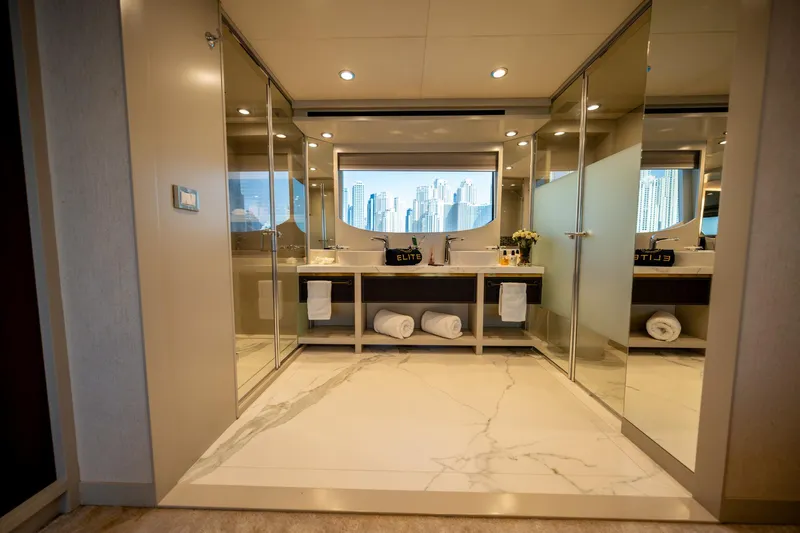  Yacht Photos Pics Luxurious bathroom interior on 2016 Numarine 105HT yacht with cityscape view.