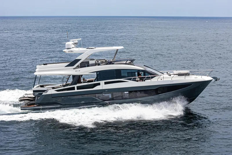  Yacht Photos Pics 2023 Galeon 640 Fly yacht cruising on open sea.