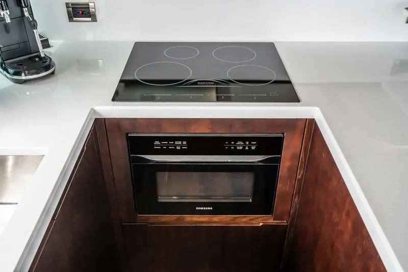  Yacht Photos Pics Modern kitchen in 2023 Galeon 640 Fly yacht with stove and oven.