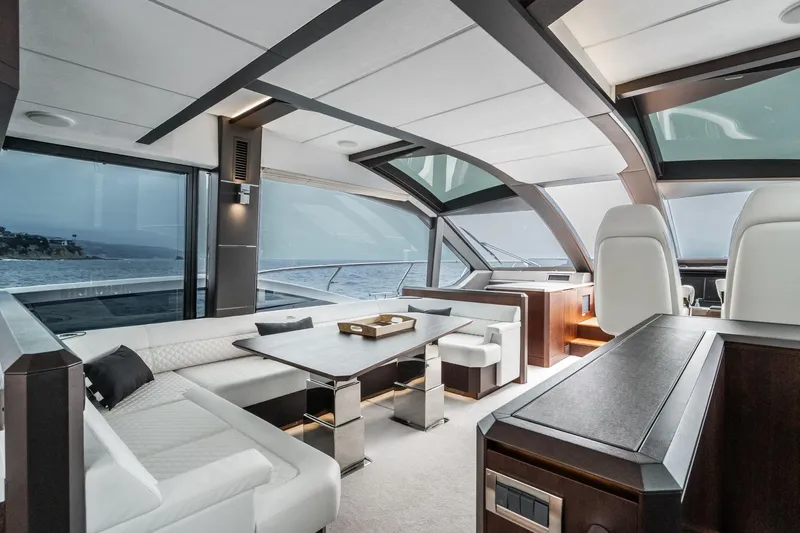  Yacht Photos Pics Luxurious interior of 2023 Galeon 640 Fly yacht with modern seating and ocean view.