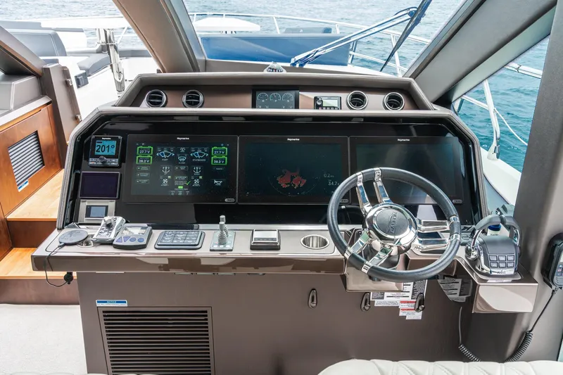  Yacht Photos Pics 2023 Galeon 640 Fly yacht helm with advanced navigation displays and controls.
