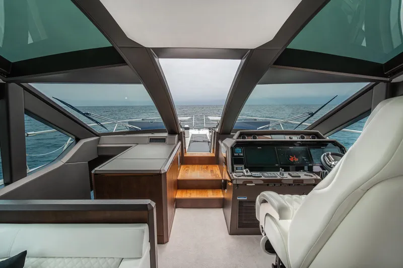  Yacht Photos Pics Luxurious 2023 Galeon 640 Fly yacht interior with modern helm and ocean view.