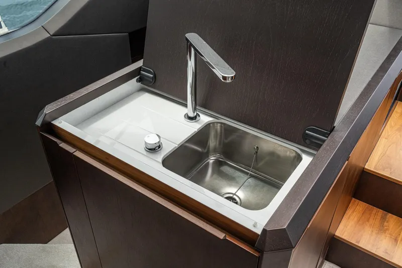  Yacht Photos Pics Luxury sink area on 2023 Galeon 640 Fly yacht, featuring modern design and sleek faucet.