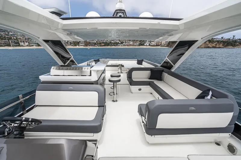  Yacht Photos Pics Luxurious 2023 Galeon 640 Fly yacht with spacious seating and ocean view.