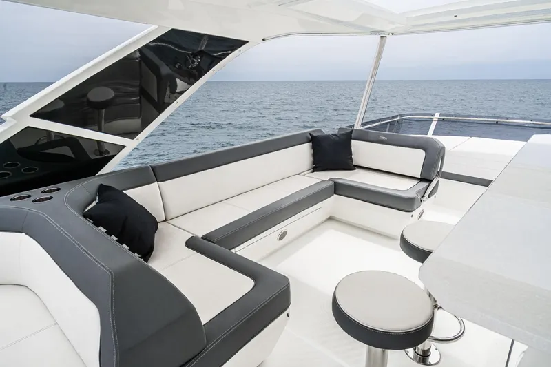  Yacht Photos Pics Luxurious seating area on 2023 Galeon 640 Fly yacht with ocean view.