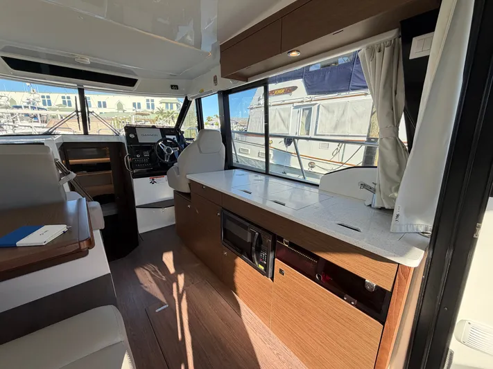  Yacht Photos Pics Interior of 2023 Jeanneau NC 1095 Fly with modern amenities.
