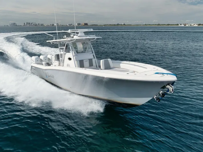 T/t No Shortcuts Yacht Photos Pics 2020 Invincible Open Fisherman boat cruising on open water.