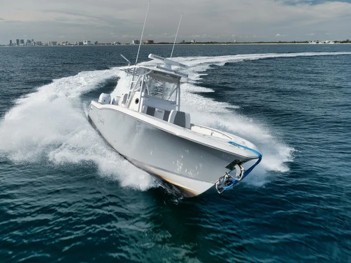 T/t No Shortcuts Yacht Photos Pics 2020 Invincible Open Fisherman boat cruising on open water.