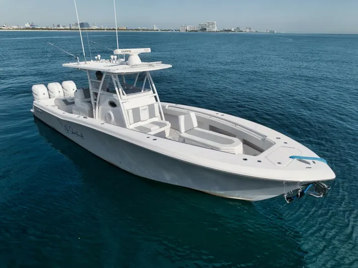 T/t No Shortcuts Yacht Photos Pics 2020 Invincible Open Fisherman boat on calm blue ocean waters.