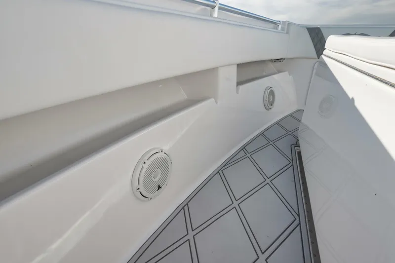 T/t No Shortcuts Yacht Photos Pics 2020 Invincible Open Fisherman boat interior with speakers and sleek design.