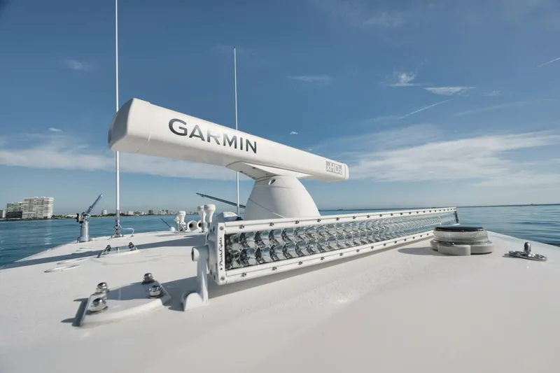 T/t No Shortcuts Yacht Photos Pics 2020 Invincible Open Fisherman boat with Garmin radar on calm sea.