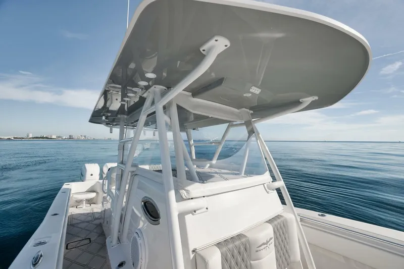 T/t No Shortcuts Yacht Photos Pics 2020 Invincible Open Fisherman boat on calm ocean waters.