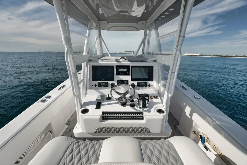 T/t No Shortcuts Yacht Photos Pics 2020 Invincible Open Fisherman boat dashboard with ocean view.