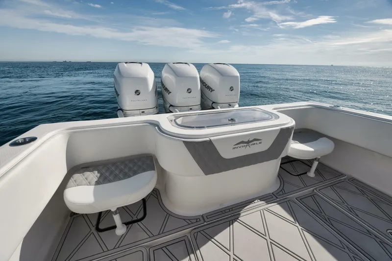 T/t No Shortcuts Yacht Photos Pics 2020 Invincible Open Fisherman boat with four engines on open sea.