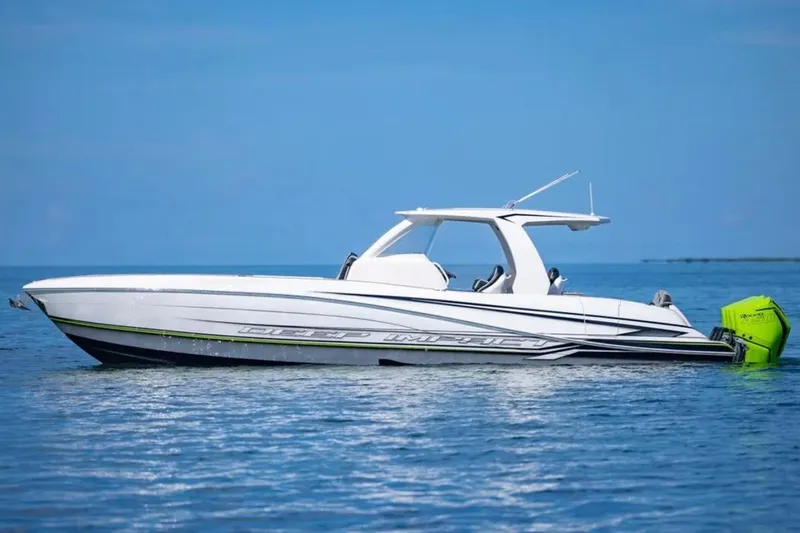  Yacht Photos Pics 2026 Deep Impact 399 Sport boat on calm blue water.