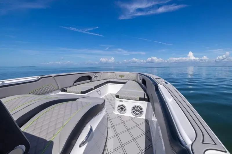  Yacht Photos Pics Luxury interior of 2026 Deep Impact 399 Sport boat on calm ocean.