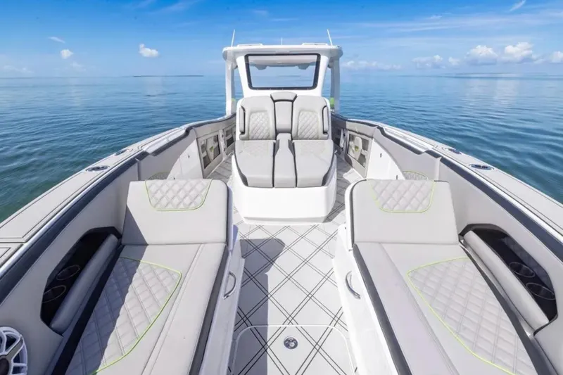  Yacht Photos Pics Luxury interior of 2026 Deep Impact 399 Sport boat on calm ocean waters.