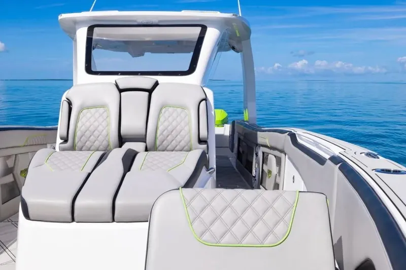  Yacht Photos Pics Luxury seating on 2026 Deep Impact 399 Sport boat, with ocean view.