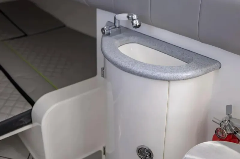  Yacht Photos Pics Interior of 2026 Deep Impact 399 Sport boat featuring a compact sink and faucet.