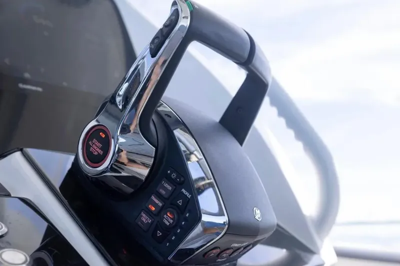  Yacht Photos Pics Close-up of 2026 Deep Impact 399 Sport boat throttle control.