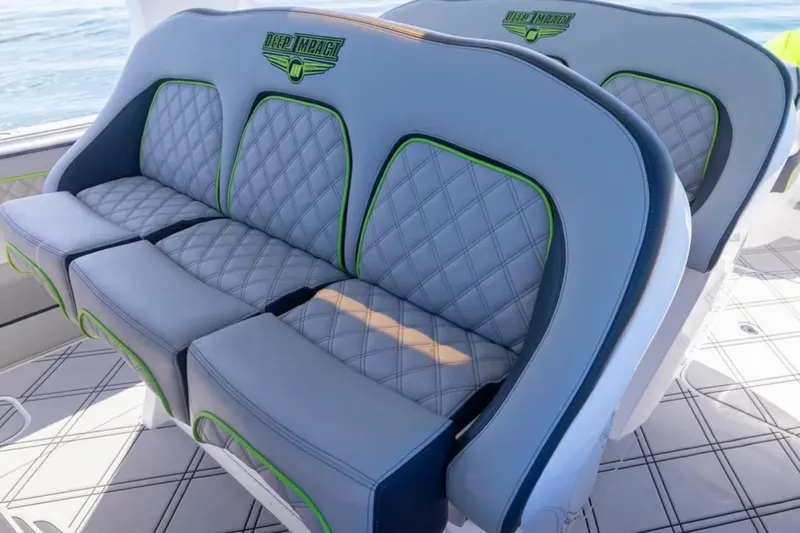  Yacht Photos Pics Luxury seating on 2026 Deep Impact 399 Sport boat with quilted design.