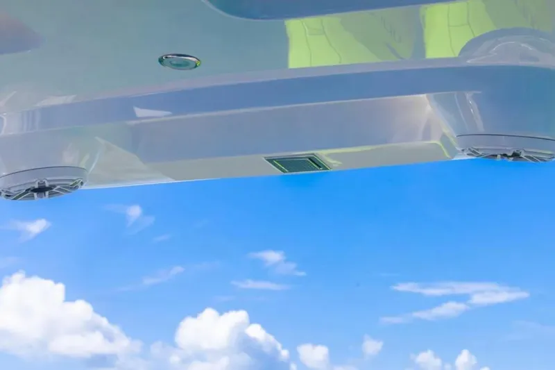  Yacht Photos Pics Underneath view of 2026 Deep Impact 399 Sport boat against a clear blue sky.