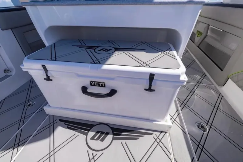  Yacht Photos Pics YETI cooler on 2026 Deep Impact 399 Sport boat with custom flooring design.