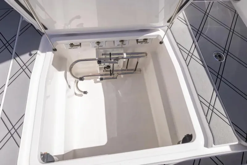  Yacht Photos Pics Open storage compartment on 2026 Deep Impact 399 Sport boat, featuring sleek interior design.