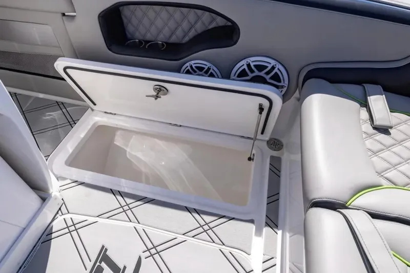  Yacht Photos Pics Open storage compartment on 2026 Deep Impact 399 Sport boat interior.