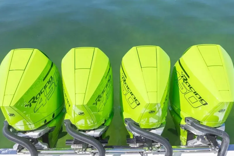  Yacht Photos Pics Four neon green Racing 450 outboard motors on a Deep Impact 399 Sport boat, 2026 model.