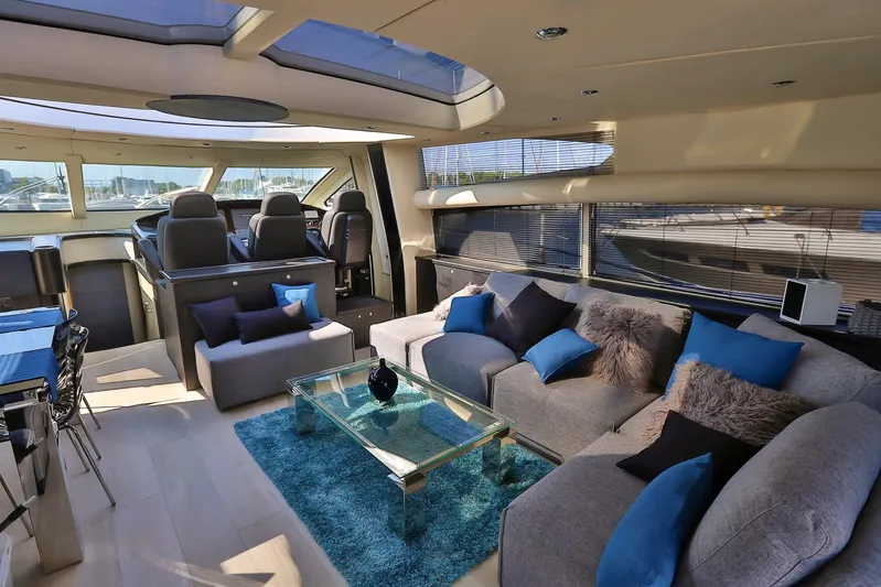 Black Zen Yacht Photos Pics Luxurious interior of 2006 Sunseeker Predator 82 yacht with plush seating and modern decor.