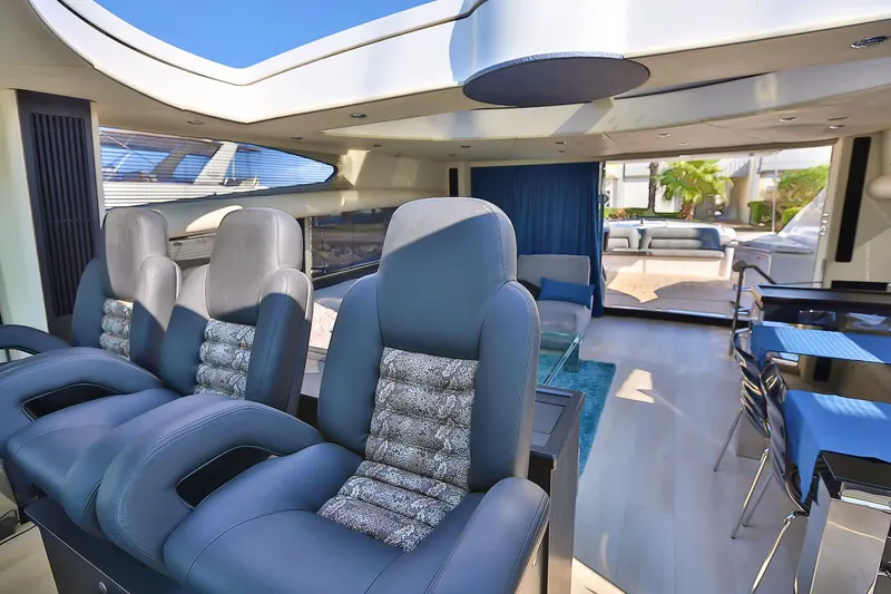 Black Zen Yacht Photos Pics Luxurious interior of 2006 Sunseeker Predator 82 yacht with modern seating and elegant design.