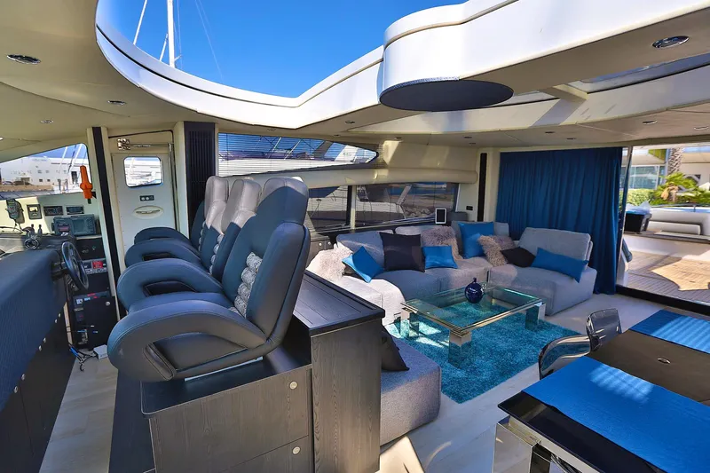 Black Zen Yacht Photos Pics Luxurious interior of 2006 Sunseeker Predator 82 yacht with plush seating and modern decor.