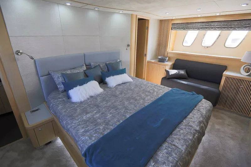 Black Zen Yacht Photos Pics Luxurious bedroom interior of 2006 Sunseeker Predator 82 yacht with modern decor.