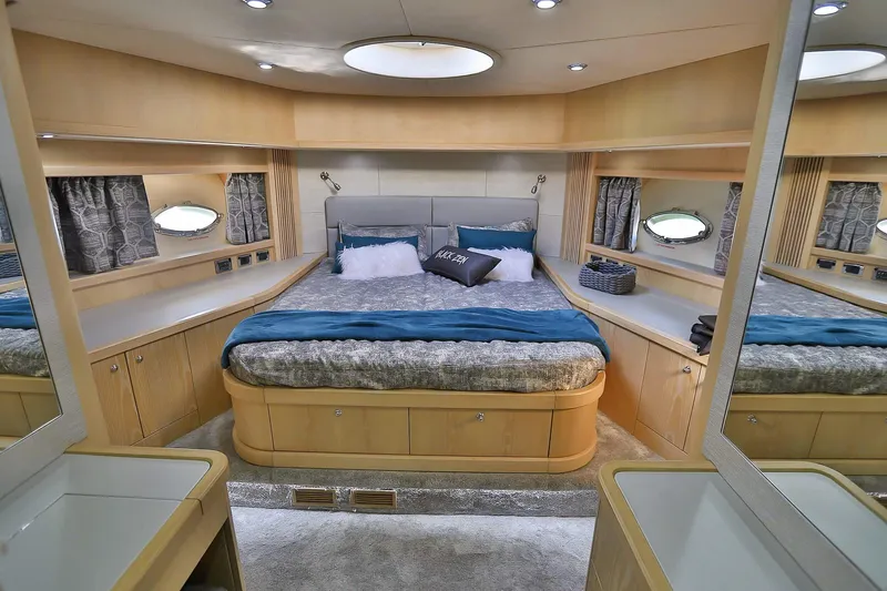 Black Zen Yacht Photos Pics Luxurious bedroom interior of 2006 Sunseeker Predator 82 yacht with elegant furnishings.
