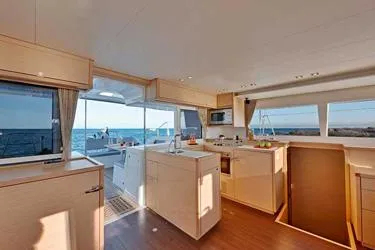 Panui Yacht Photos Pics Interior of 2019 Lagoon 450S catamaran with modern kitchen and ocean view.